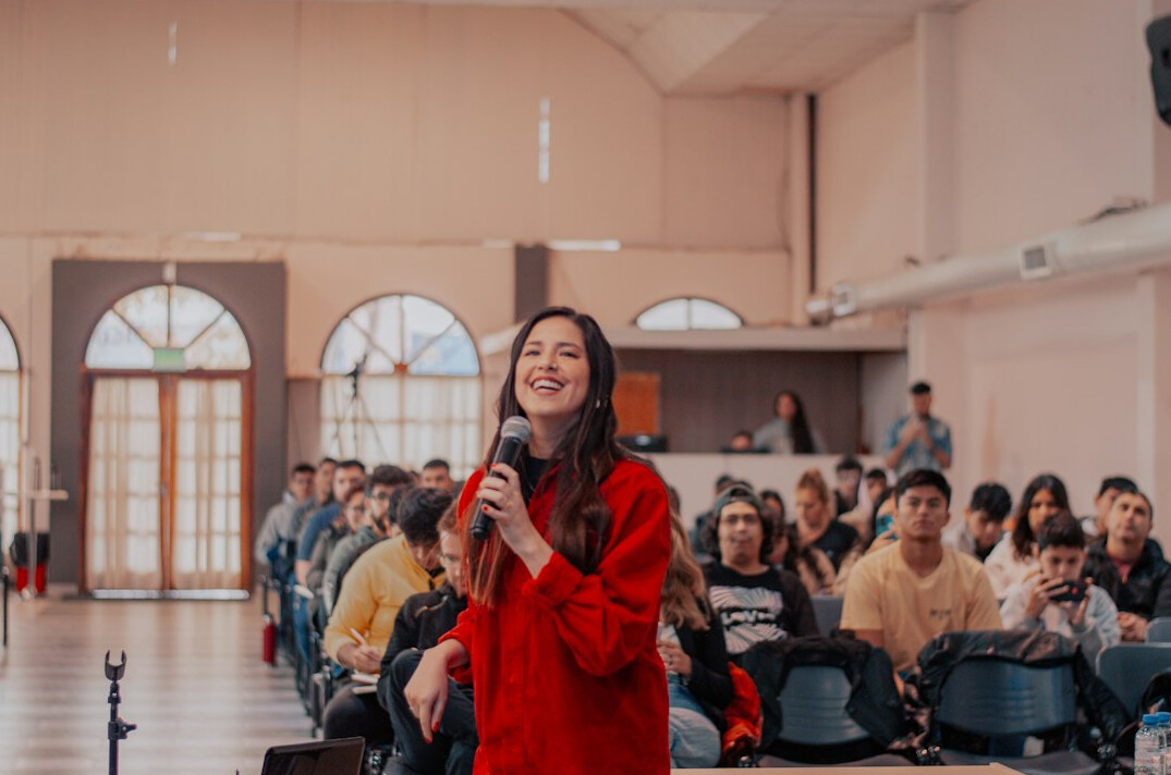 person giving presentation to audience
