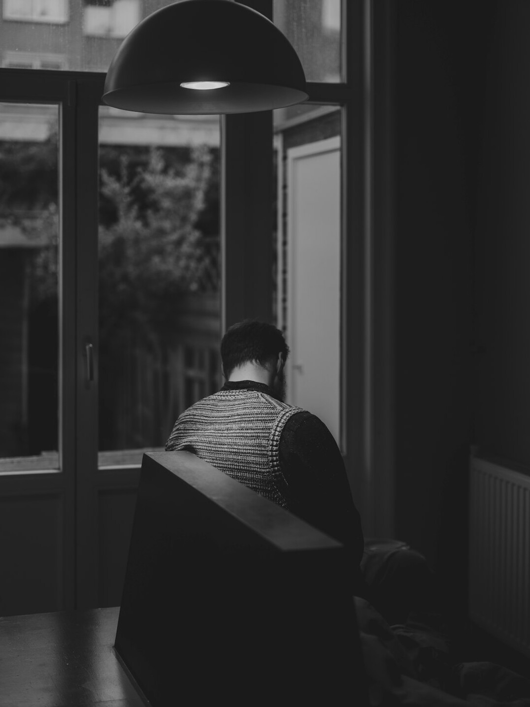 person journaling in quiet room