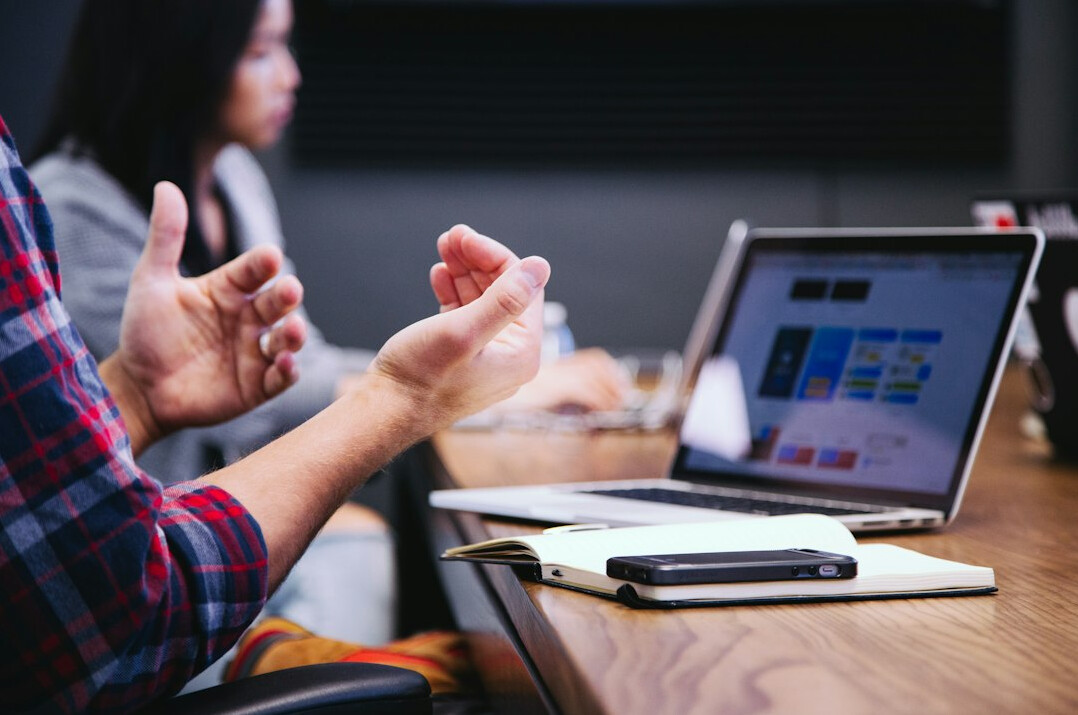 person presenting ideas in meeting