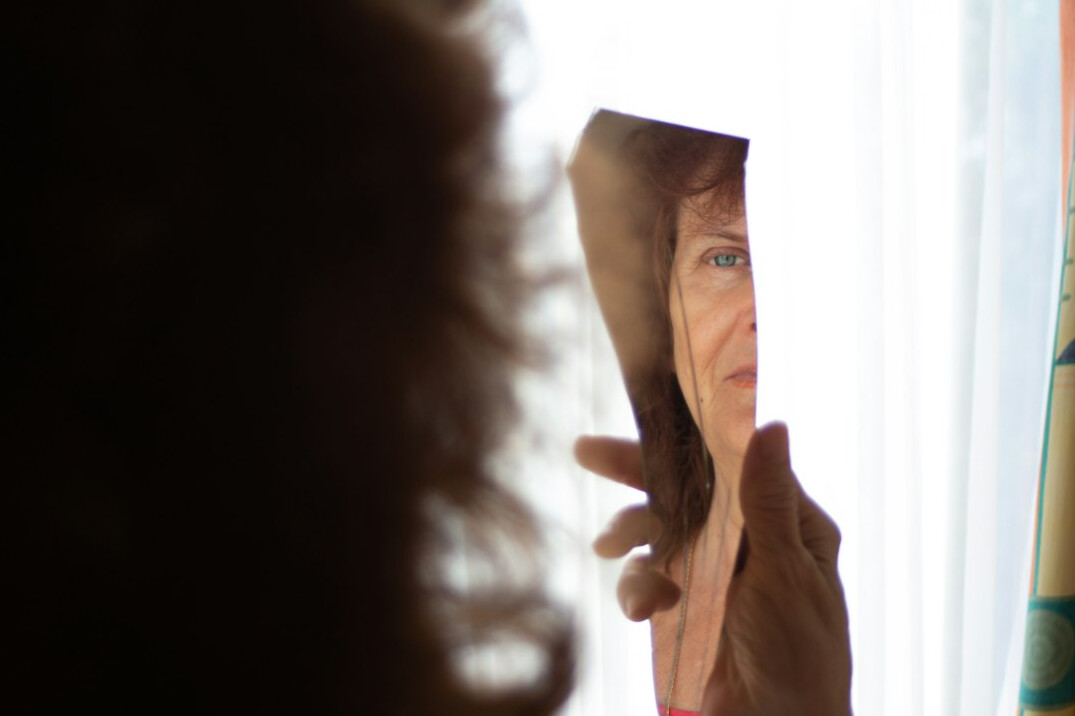 woman practicing speech in mirror